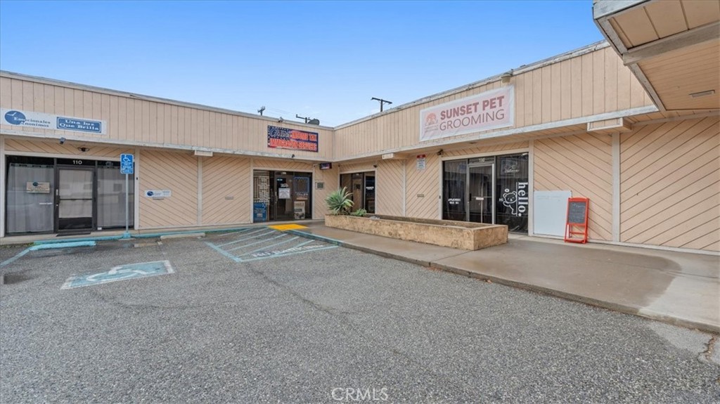 106 North Riverside Avenue Rialto, CA 92376 - Photo 5 of 18 a view of a house with a parking space