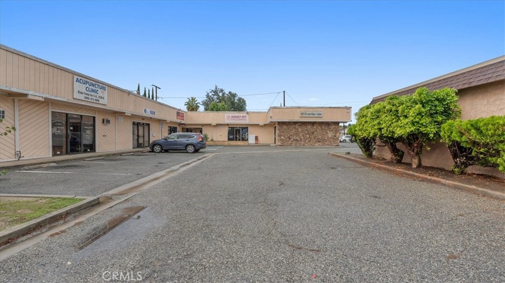 106 North Riverside Avenue Rialto, CA 92376 - Photo 6 of 18 a view of a street with houses