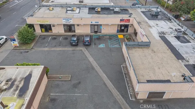 a aerial view of a house with sitting area