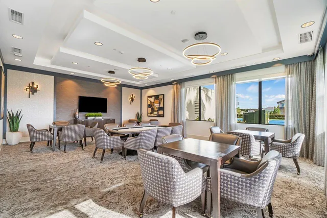 a room with wooden floor and furniture