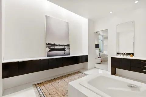 a view of living room with furniture and window