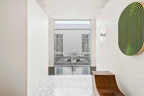 a bathroom with a bathtub and a sink