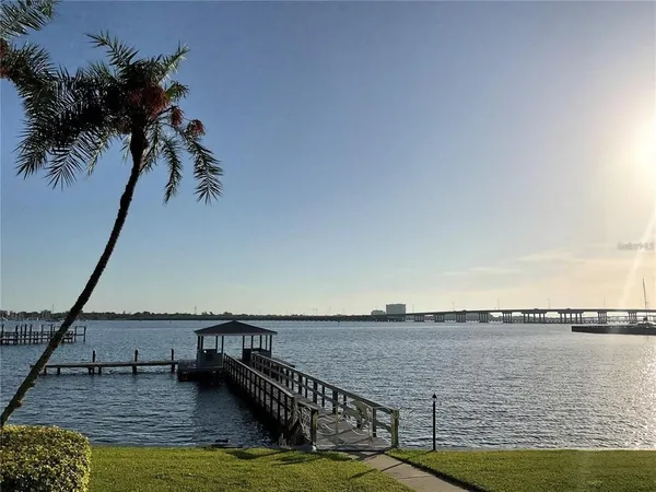 a view of a terrace with a lake view