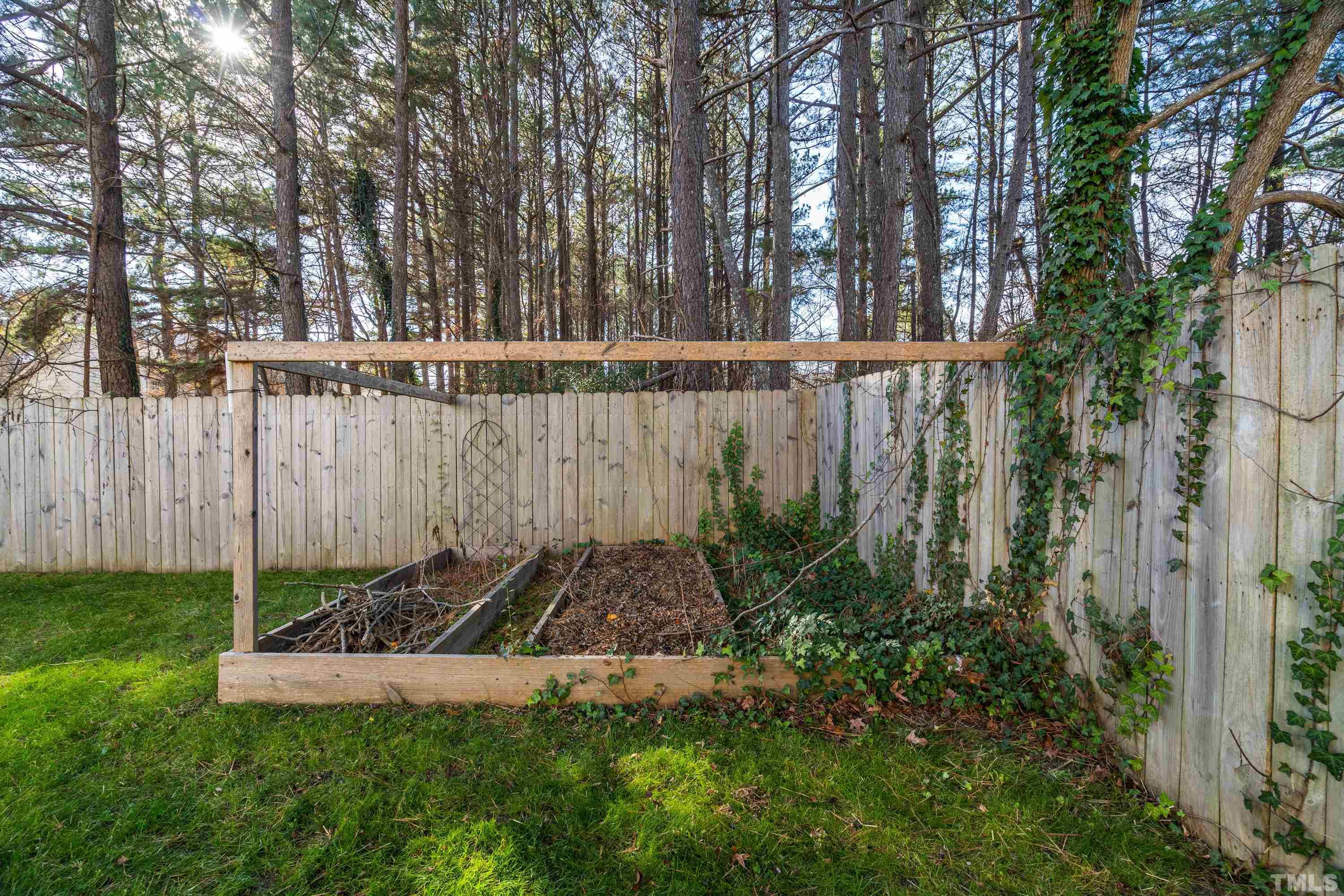 7405 Dorrington Trail Raleigh, NC 27615 - Photo 28 of 31 a view of a backyard