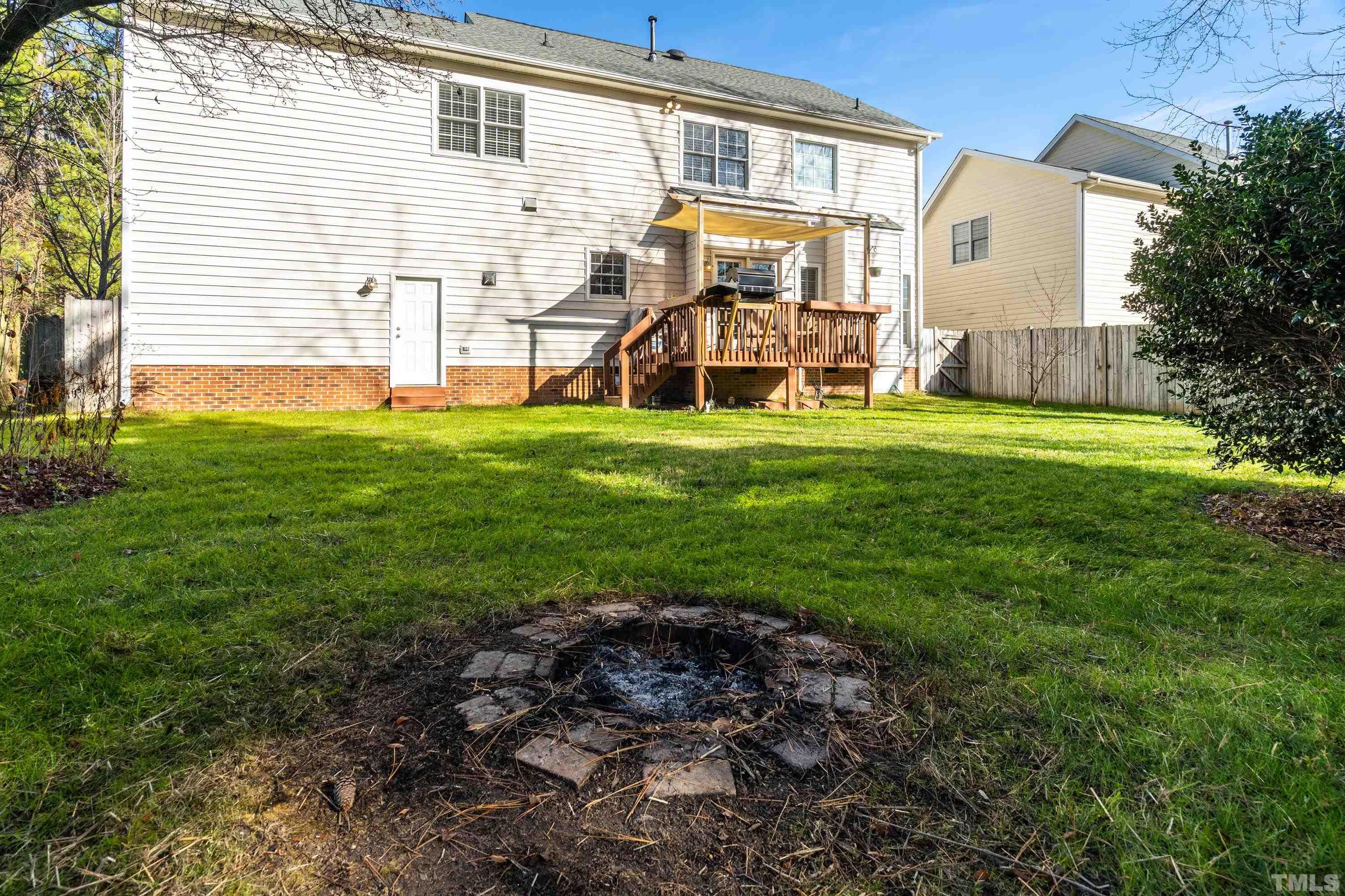 7405 Dorrington Trail Raleigh, NC 27615 - Photo 29 of 31 a view of a house with a backyard