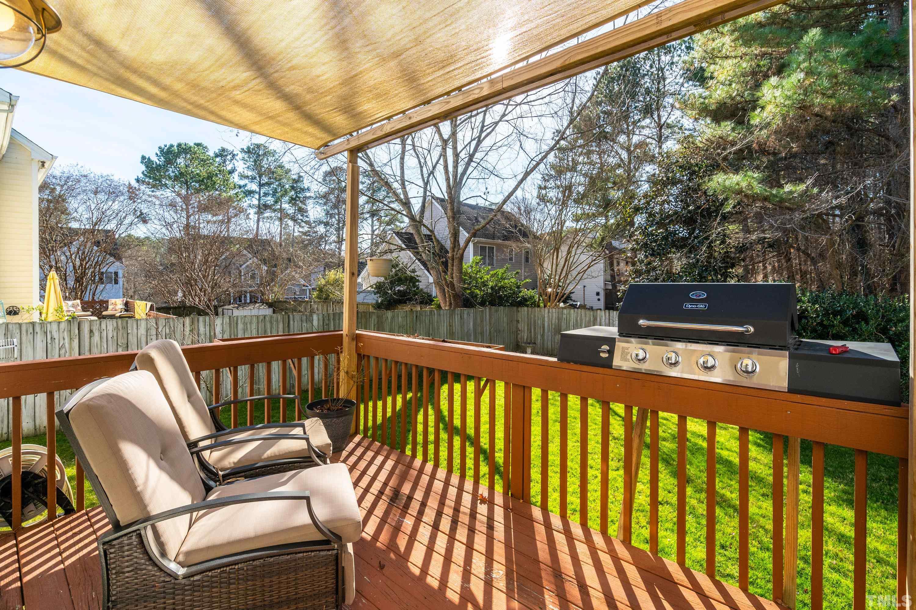 7405 Dorrington Trail Raleigh, NC 27615 - Photo 31 of 31 a view of a two chairs in the balcony