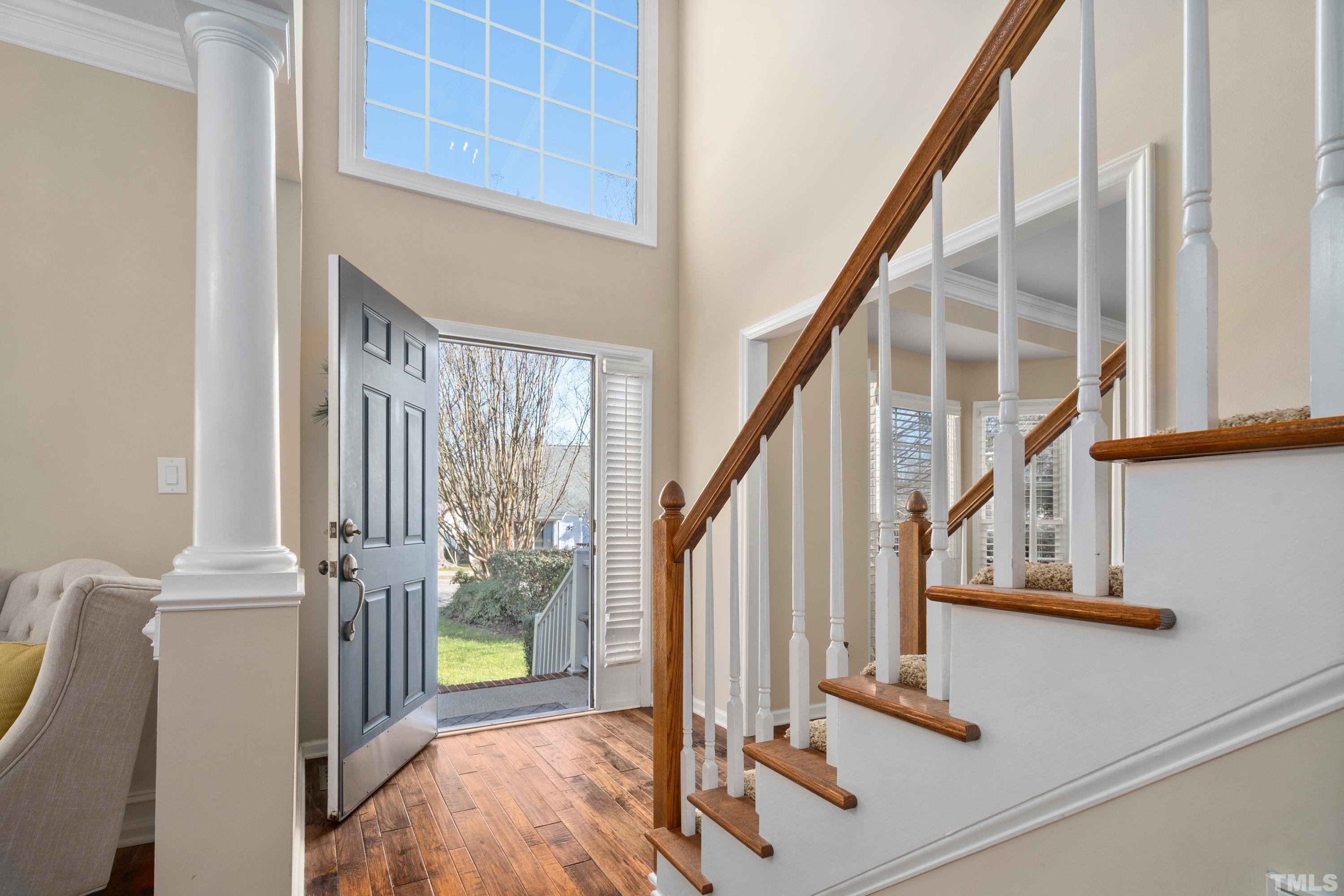 7405 Dorrington Trail Raleigh, NC 27615 - Photo 5 of 31 a view of an entryway with staircase