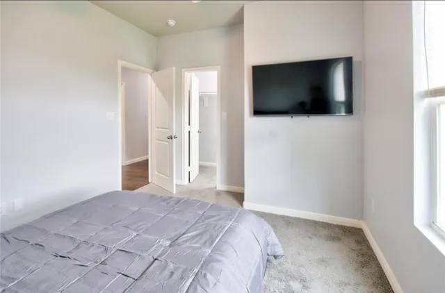 a view of a livingroom with a flat screen tv