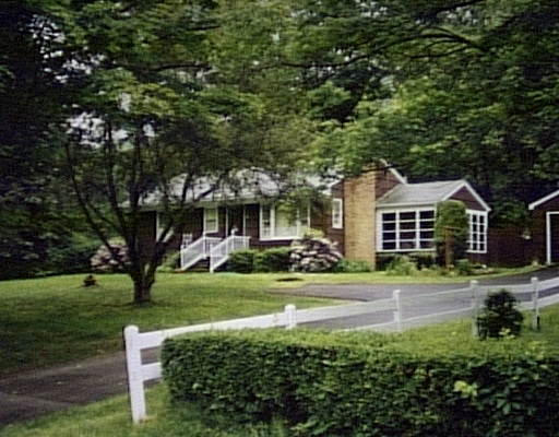 320 Spring Street Northampton, MA 01062 - Photo 1 of 1 a front view of a house with a yard