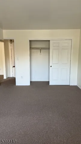 a bathroom with a toilet sink and shower