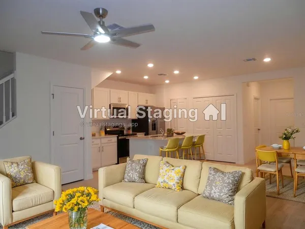 a view of a kitchen with refrigerator and microwave