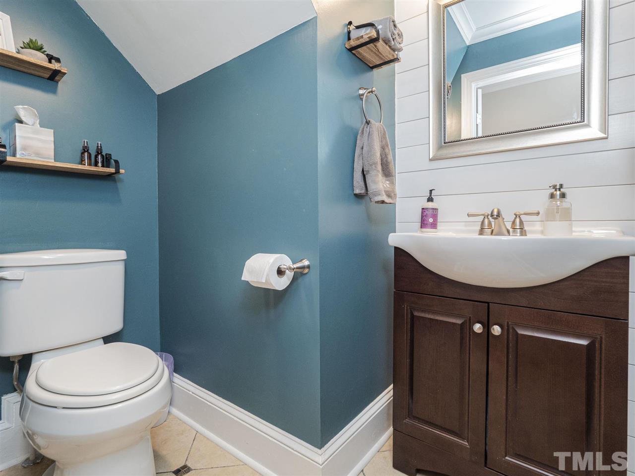 6108 Bur Trail Raleigh, NC 27616 - Photo 12 of 30 a bathroom with a sink and a toilet