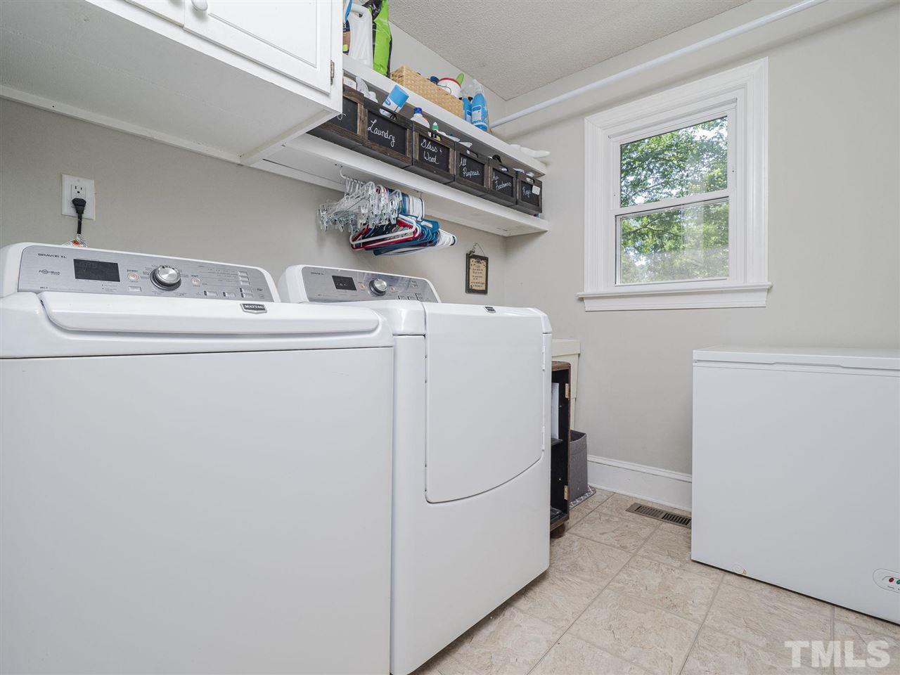 6108 Bur Trail Raleigh, NC 27616 - Photo 24 of 30 a utility room with dryer and washer