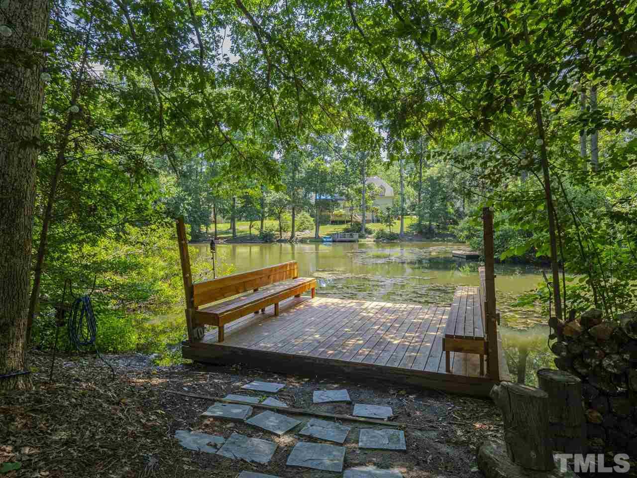 6108 Bur Trail Raleigh, NC 27616 - Photo 27 of 30 a view of a lake with a outdoor space