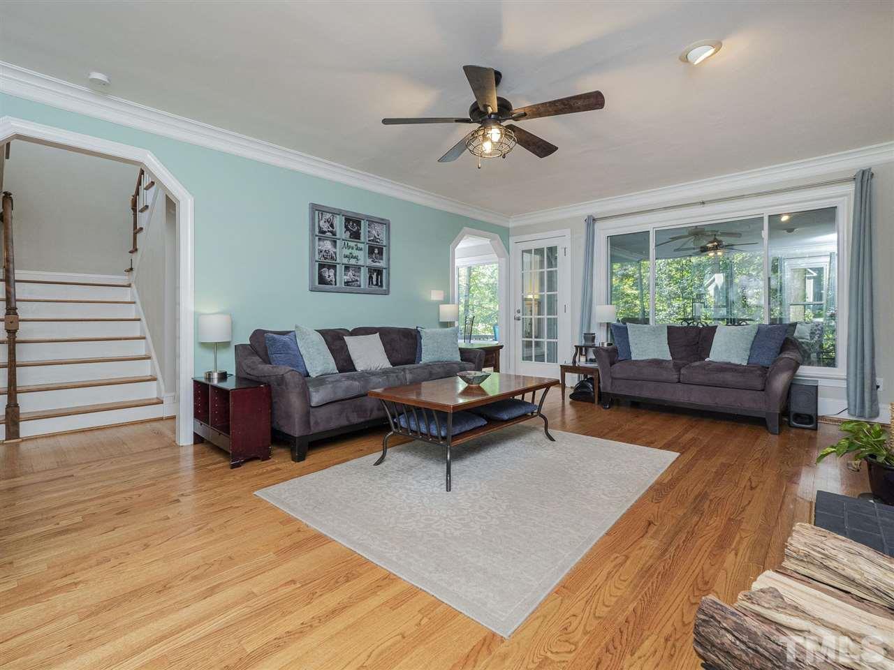 6108 Bur Trail Raleigh, NC 27616 - Photo 6 of 30 a living room with furniture and a wooden floor