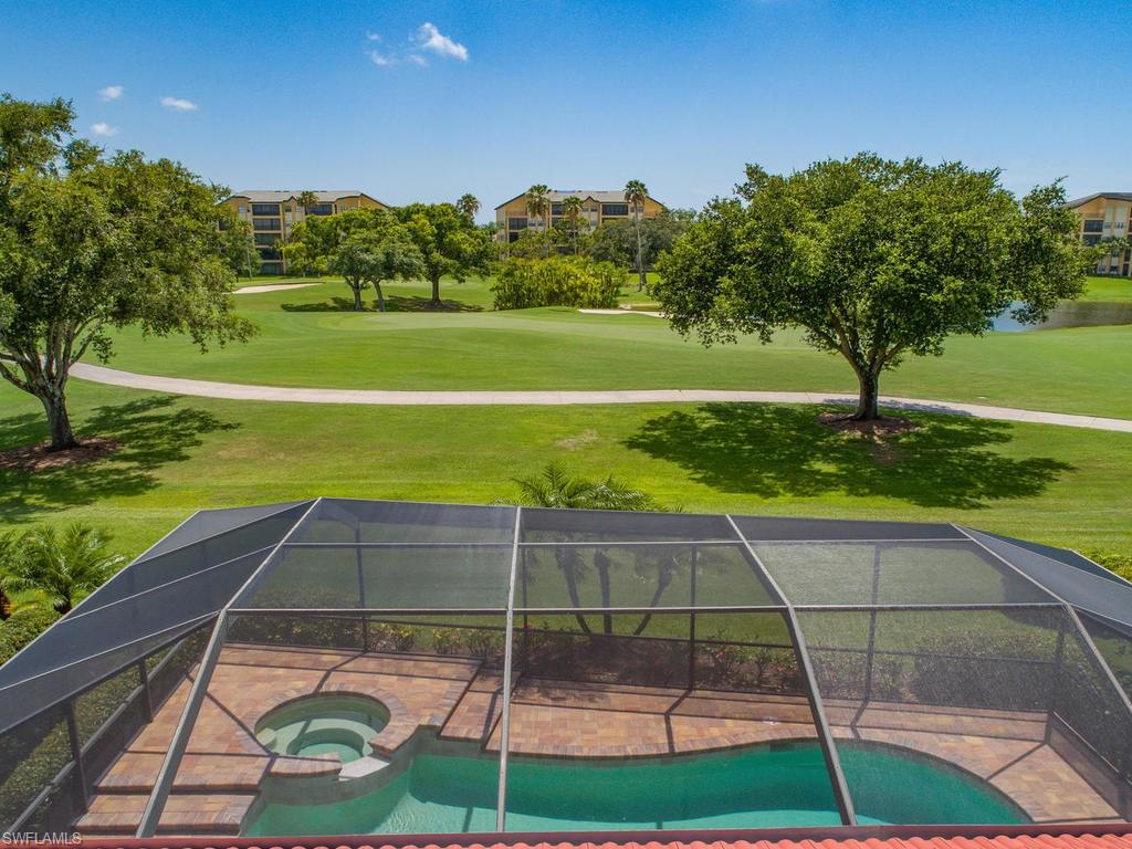 104 Napa Ridge Way Naples, FL 34119 - Photo 4 of 29 a view of a tennis court