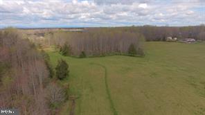 632 Sumerduck Road Sumerduck, VA 22742 - Photo 7 of 8 a view of a lake from a yard