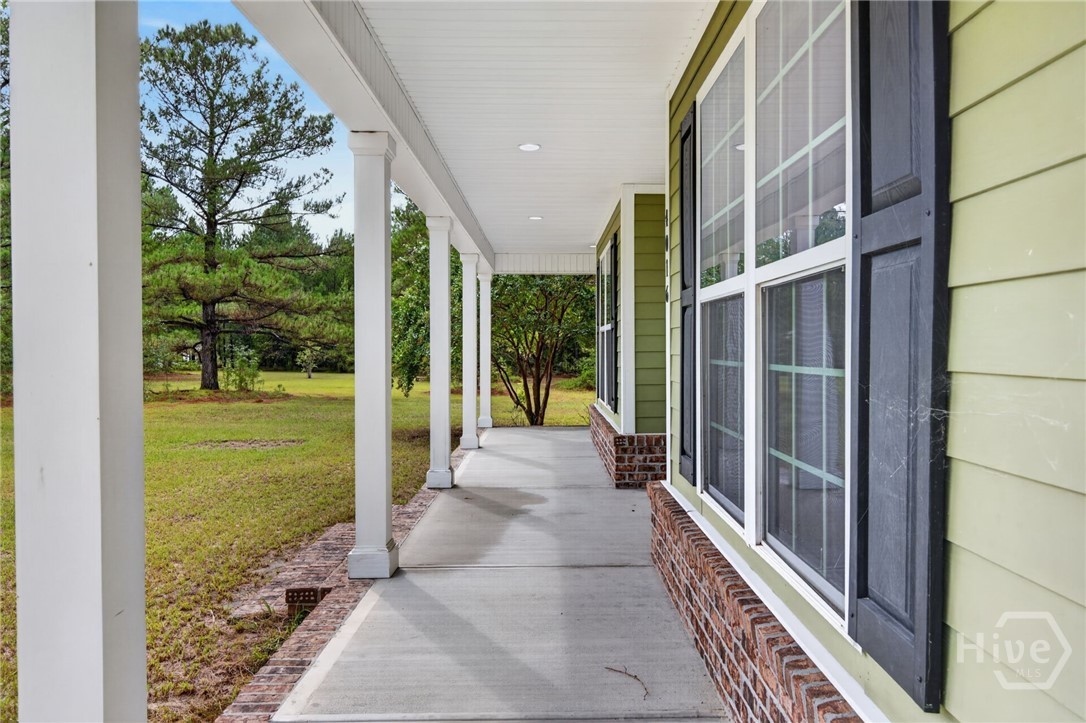 4016 Clyo-Kildare Road Clyo, GA 31303 - Photo 8 of 58 Watch the days pass by on your front porch!