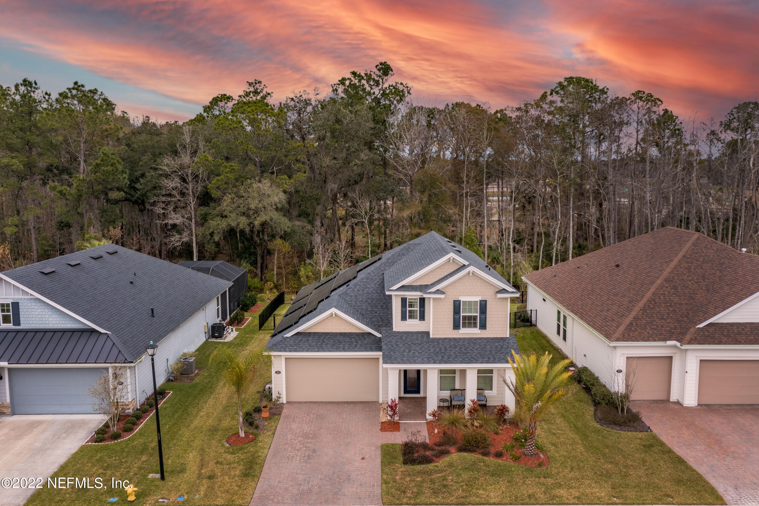 211 Orchard Lane St. Augustine, FL 32095 - Photo 1 of 59 a aerial view of a house next to a yard