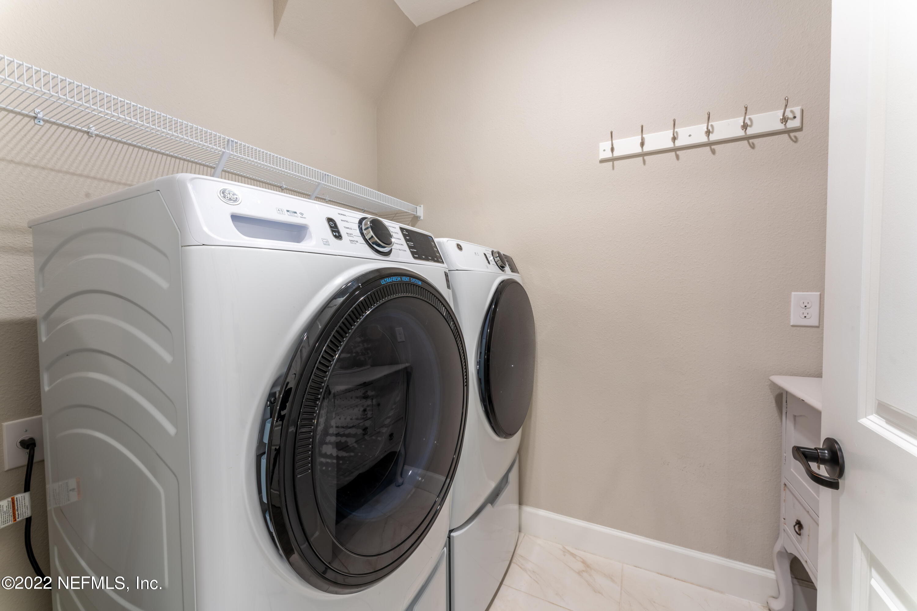 211 Orchard Lane St. Augustine, FL 32095 - Photo 29 of 59 a utility room with dryer and washer