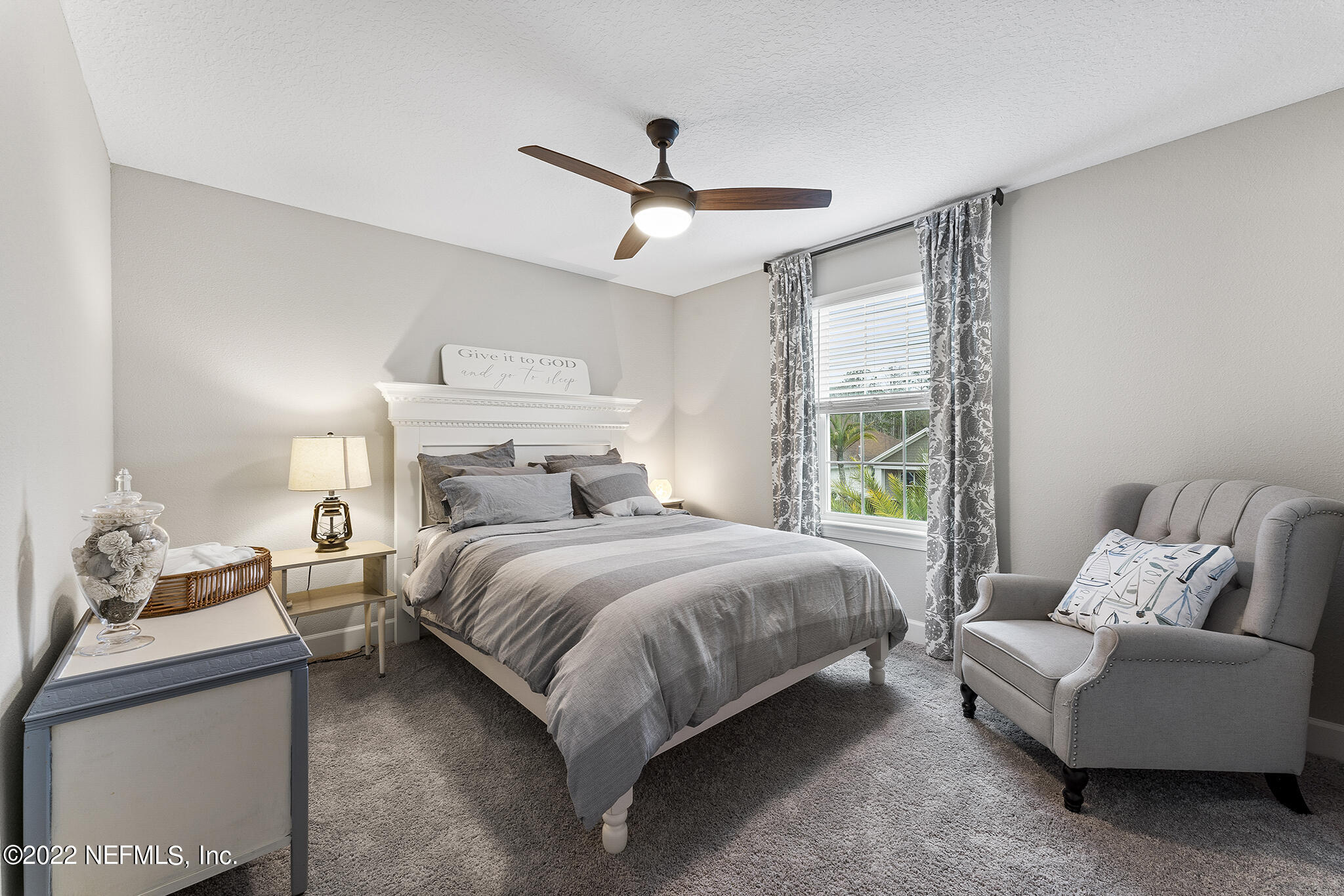 211 Orchard Lane St. Augustine, FL 32095 - Photo 33 of 59 a bedroom with a bed and a couch
