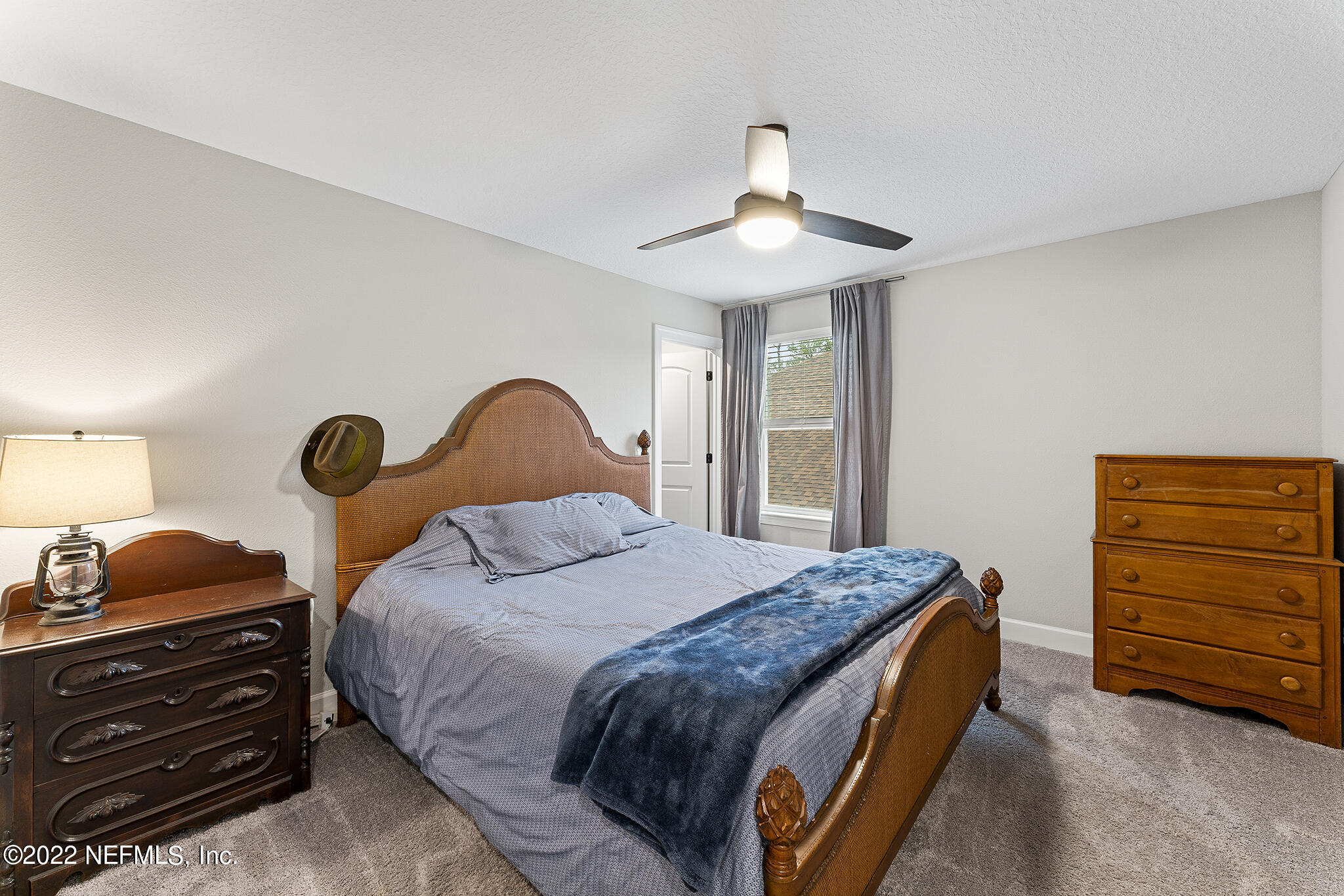 211 Orchard Lane St. Augustine, FL 32095 - Photo 37 of 59 a bedroom with a bed and a closet