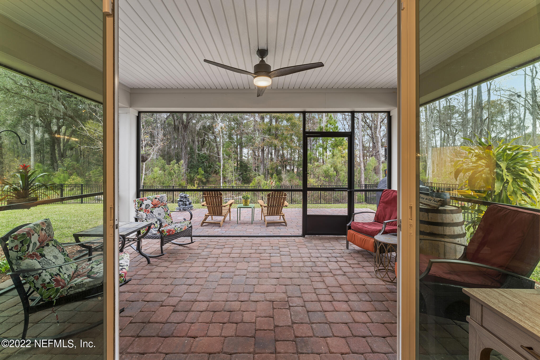 211 Orchard Lane St. Augustine, FL 32095 - Photo 38 of 59 a living room with patio furniture and garden view