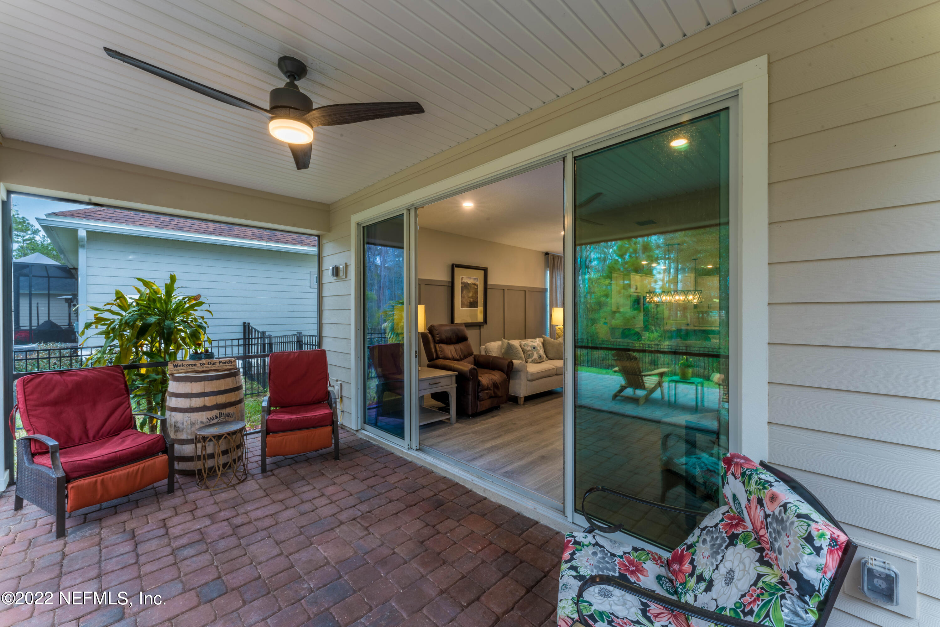 211 Orchard Lane St. Augustine, FL 32095 - Photo 39 of 59 a outdoor living space with furniture and a potted plant