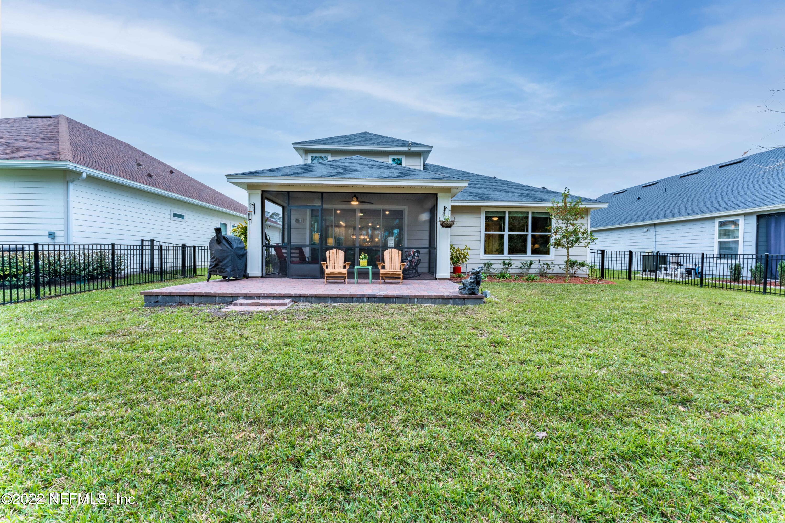 211 Orchard Lane St. Augustine, FL 32095 - Photo 44 of 59 a view of a house with a backyard