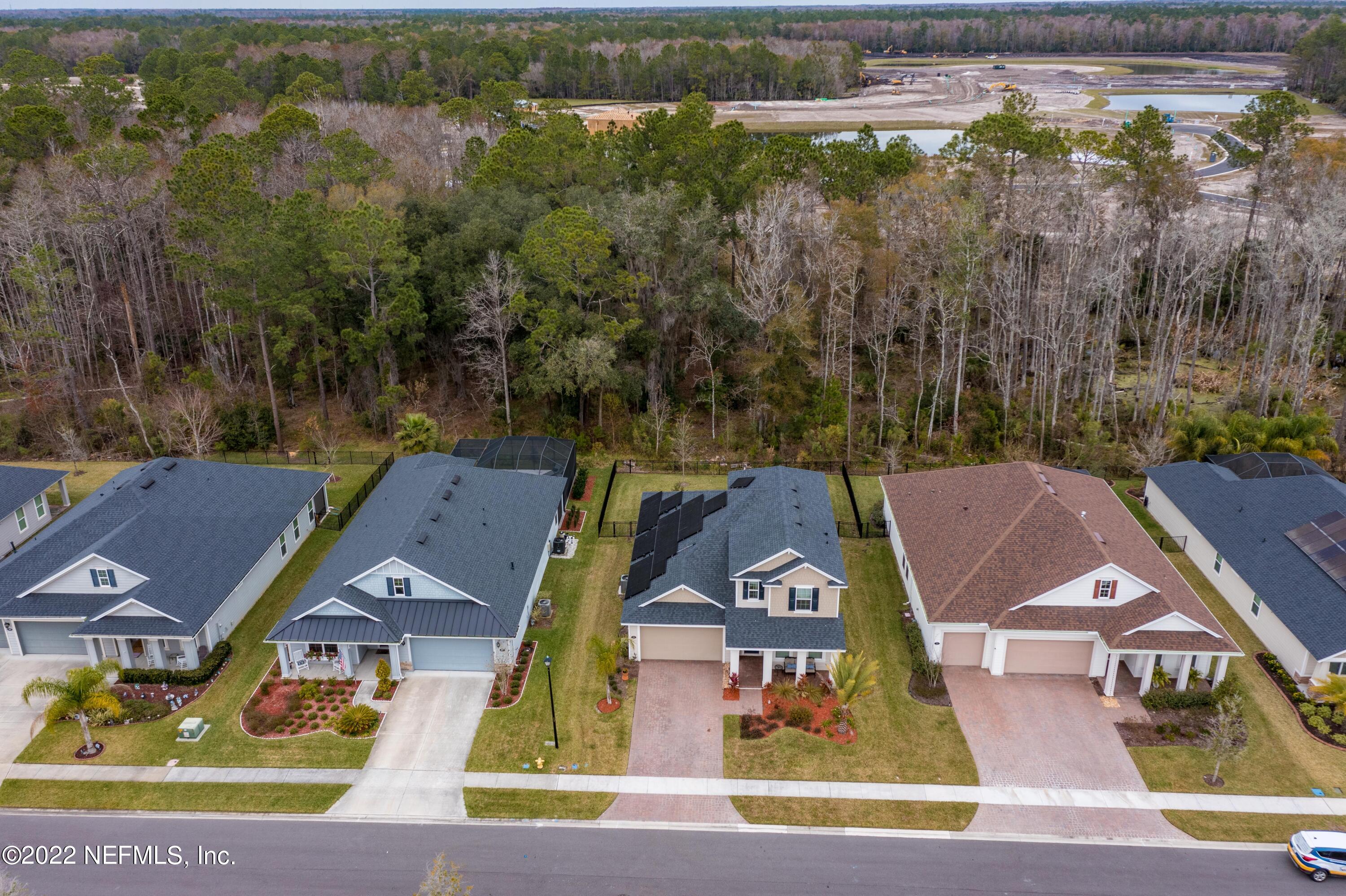 211 Orchard Lane St. Augustine, FL 32095 - Photo 48 of 59 an aerial view of a house with a garden