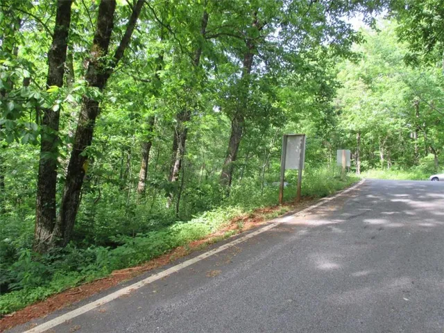 a view of a house with a street