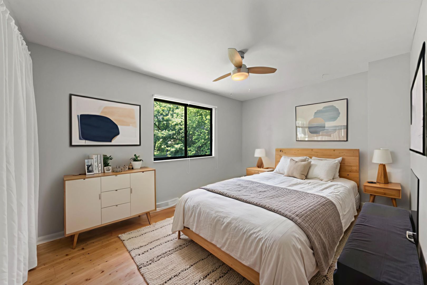 698 Circle Drive Roselle, IL 60172 - Photo 21 of 31 a bedroom with a large bed and a flat screen tv