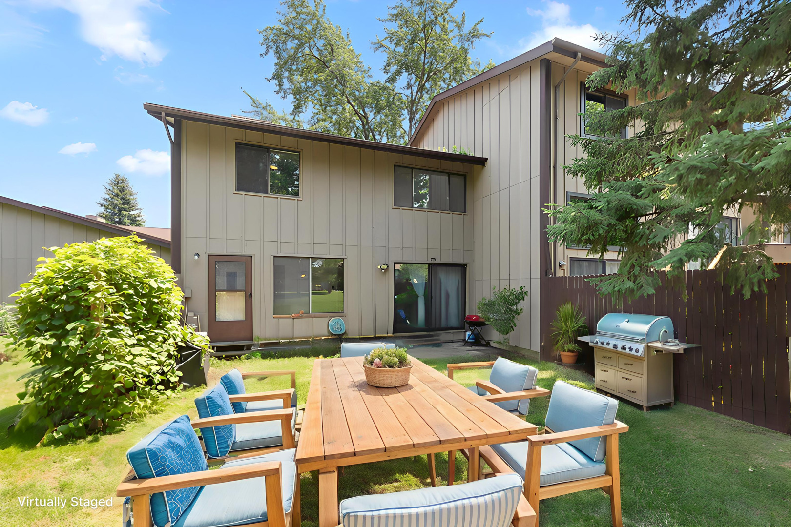 698 Circle Drive Roselle, IL 60172 - Photo 25 of 31 a patio with table and chairs and potted plants