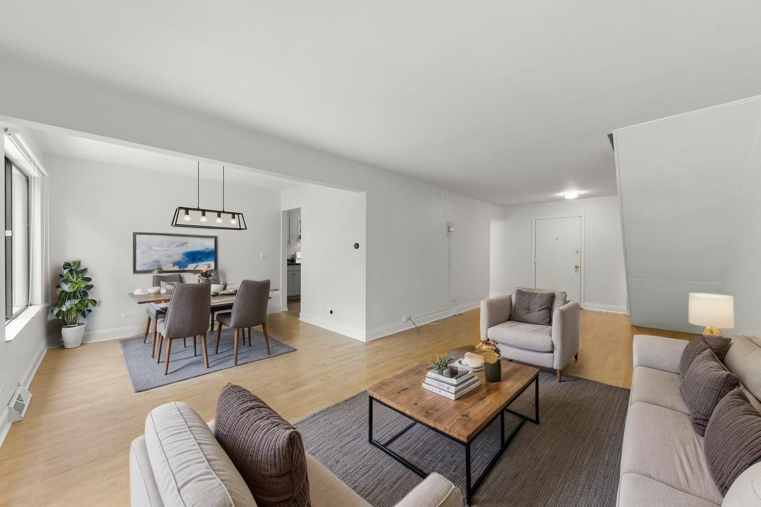 698 Circle Drive Roselle, IL 60172 - Photo 4 of 31 a living room with furniture and a table