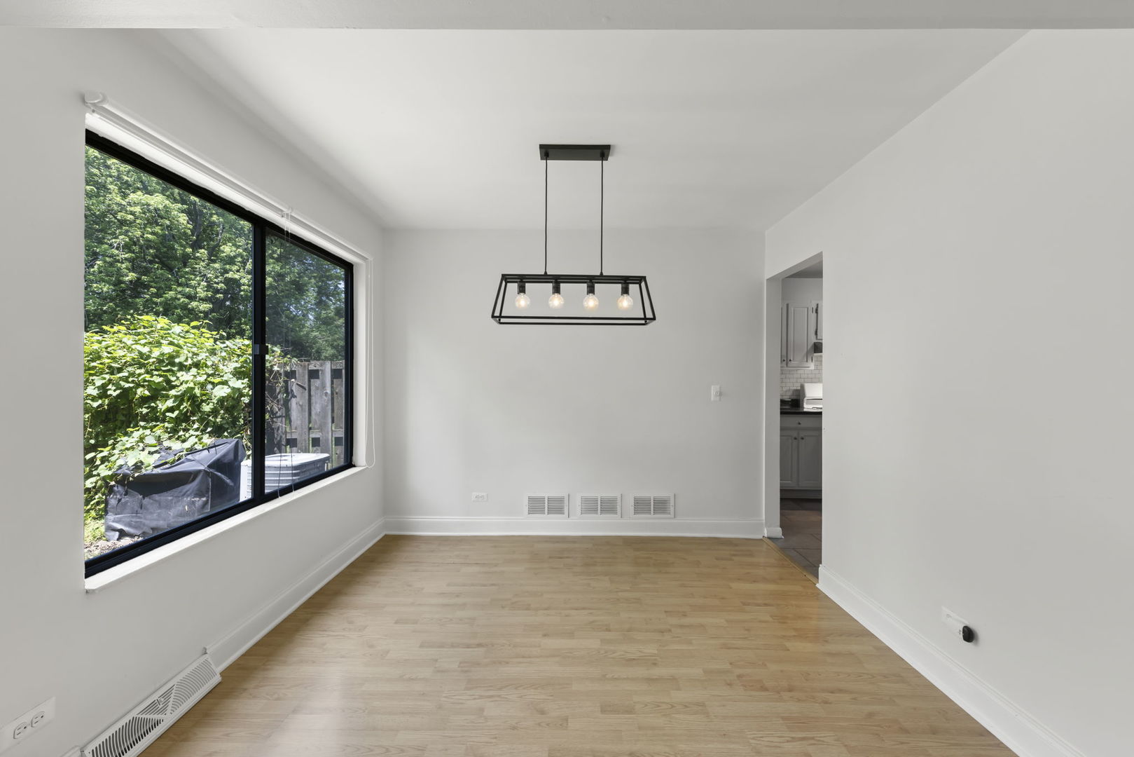 698 Circle Drive Roselle, IL 60172 - Photo 7 of 31 a view of a room with a large window