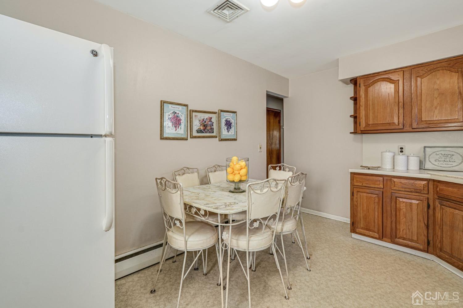 22 Morningside Road Colonia, NJ 07067 - Photo 13 of 31 a view of a dining room with furniture