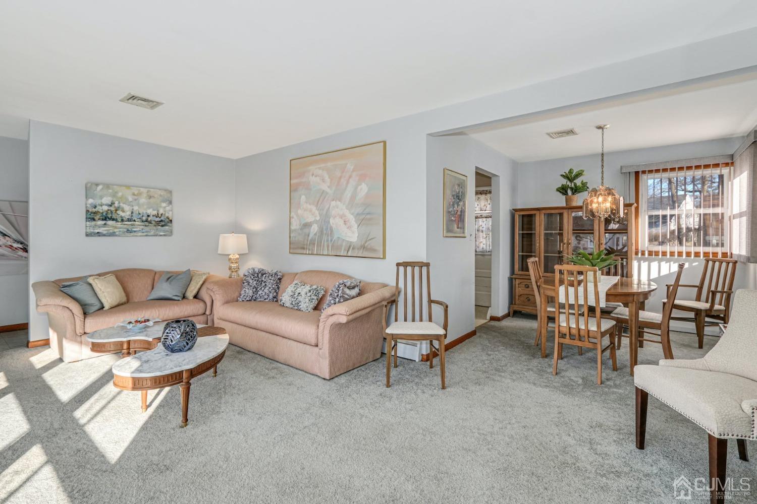 22 Morningside Road Colonia, NJ 07067 - Photo 7 of 31 a living room with furniture and a table