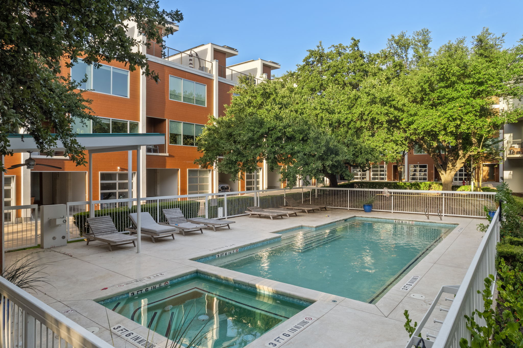 2301 South 5th Street, Unit 25 Austin, TX 78704 - Photo 34 of 35 Community pool featuring a patio and a hot tub