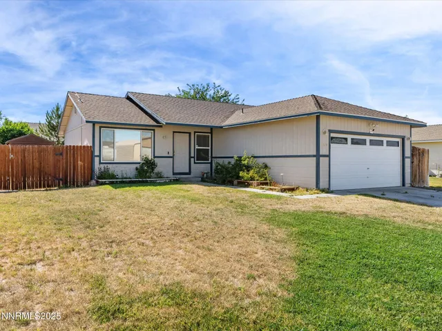 a house view with a garden space