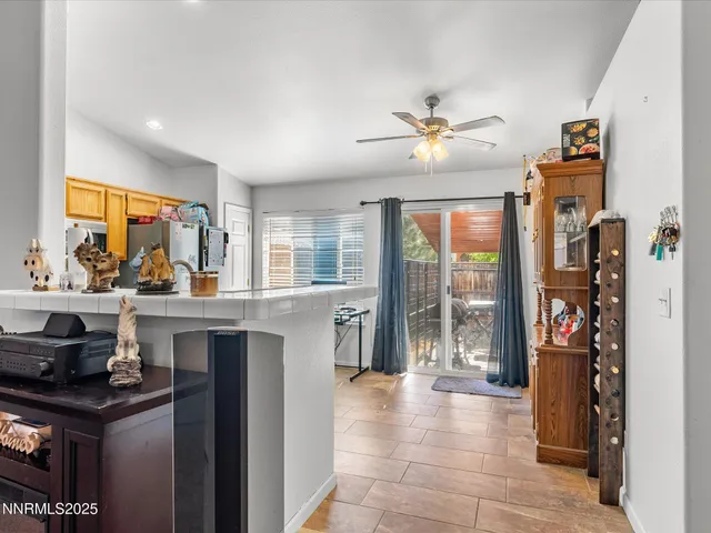 a kitchen with stainless steel appliances granite countertop a stove and a refrigerator