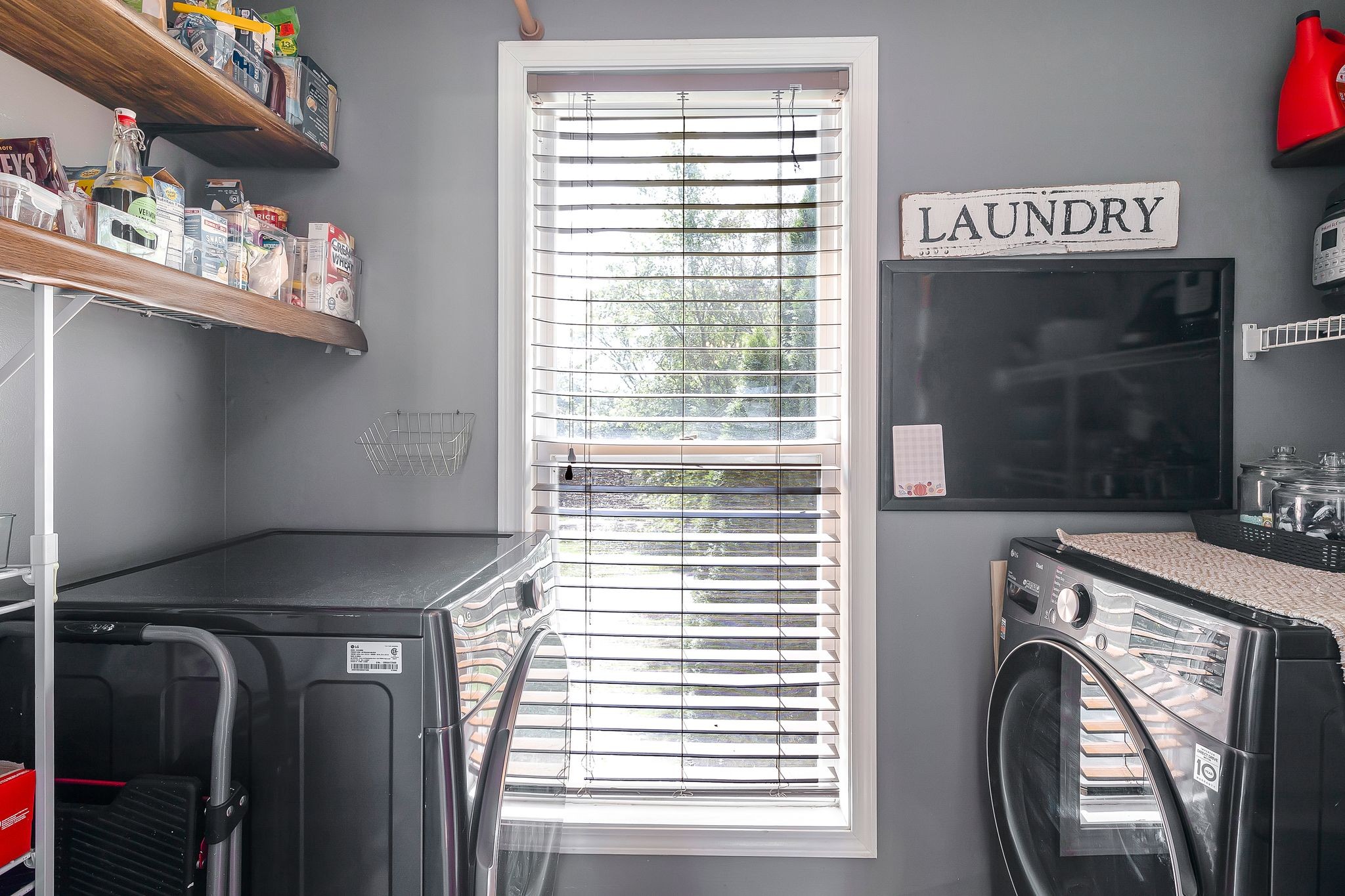 475 Wooten Road Clarksville, TN 37042 - Photo 13 of 29 Large Laundry room right off kitchen with window for natural light.