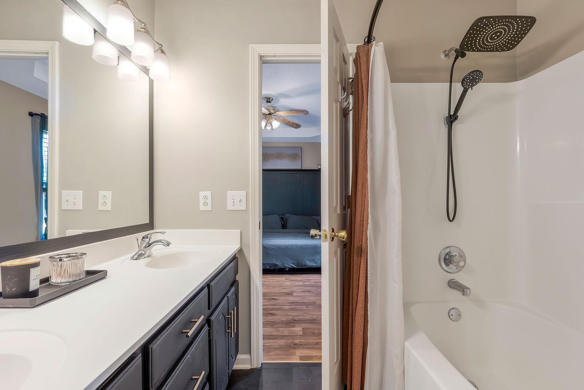 475 Wooten Road Clarksville, TN 37042 - Photo 17 of 29 Updated lighting and extra-large shower head.