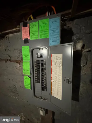 a bathroom with a sink mirror vanity and toilet