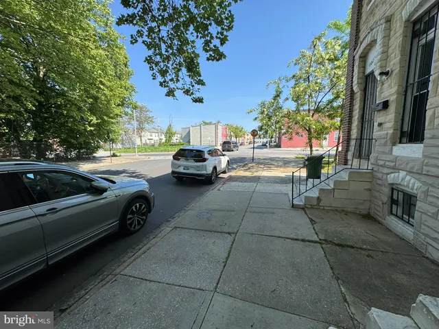 a view of an empty room with stairs