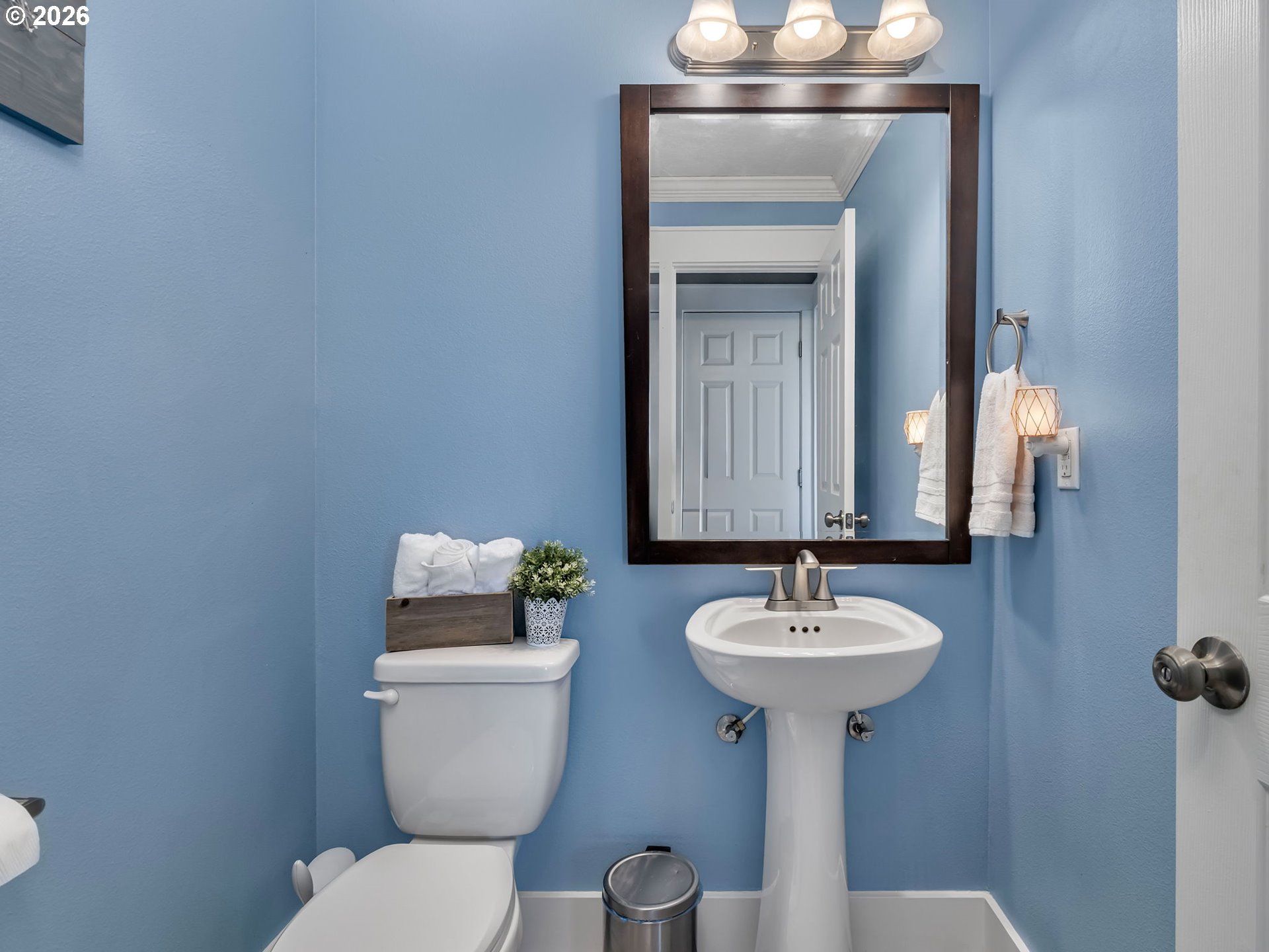 19775 Northeast Trunk Road Dundee, OR 97115 - Photo 18 of 48 a bathroom with a toilet sink and mirror