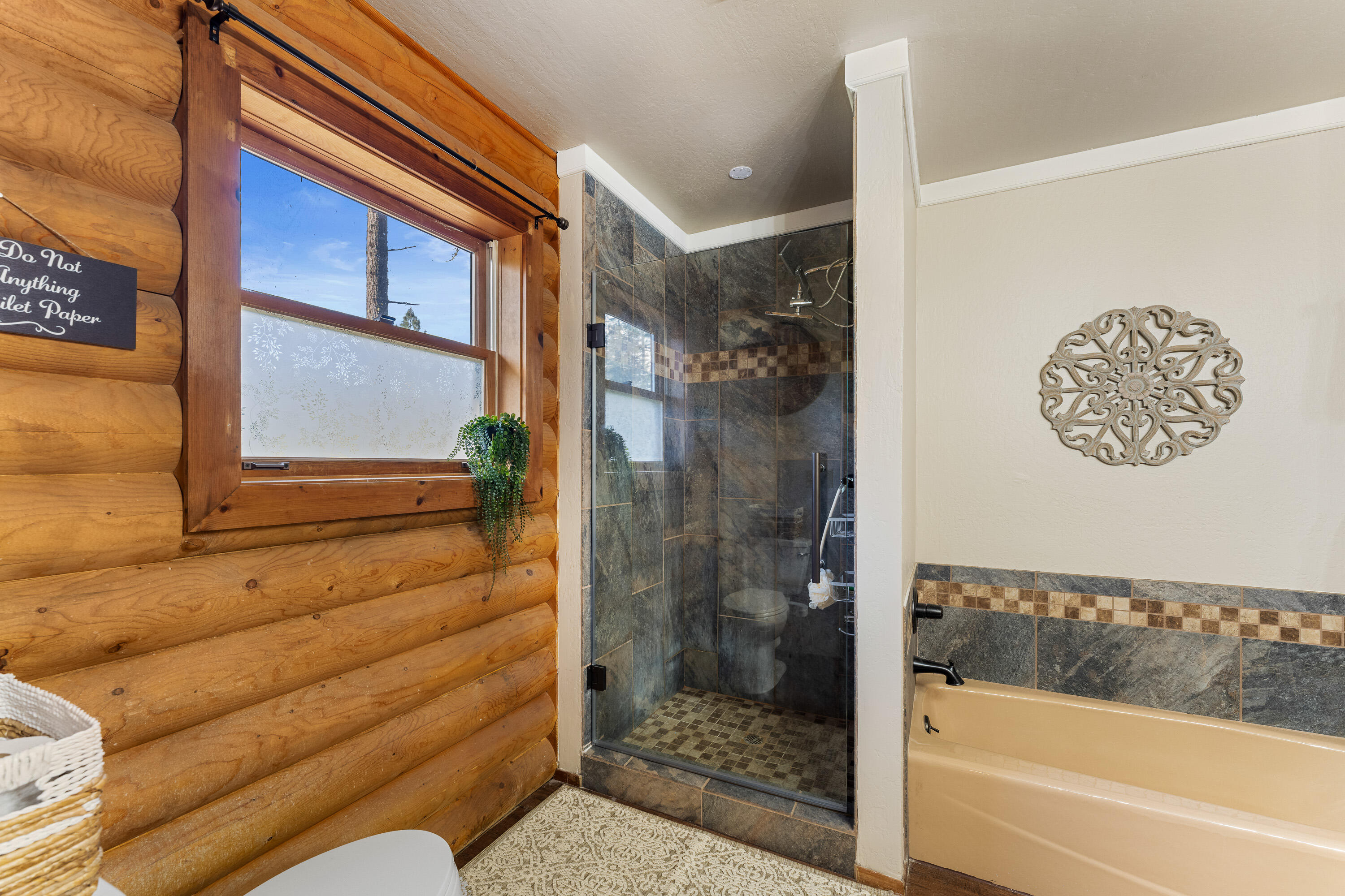 1201 Reeves Creek Road Selma, OR 97538 - Photo 17 of 38 a bathroom with a bathtub and shower