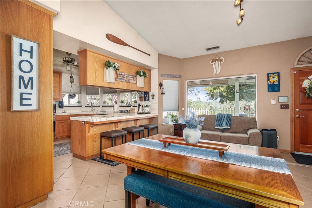 46455 Konklin Road Coarsegold, CA 93614 - Photo 11 of 46 a living room with stainless steel appliances granite countertop furniture and a large window