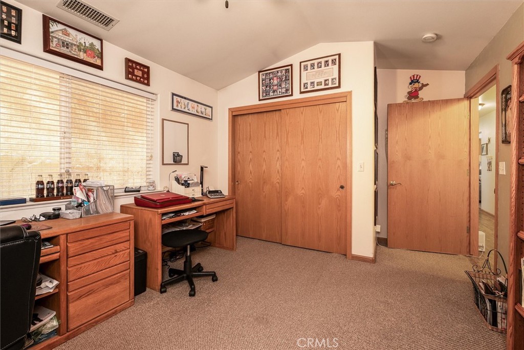 46455 Konklin Road Coarsegold, CA 93614 - Photo 21 of 46 a view of a workspace with furniture and a window