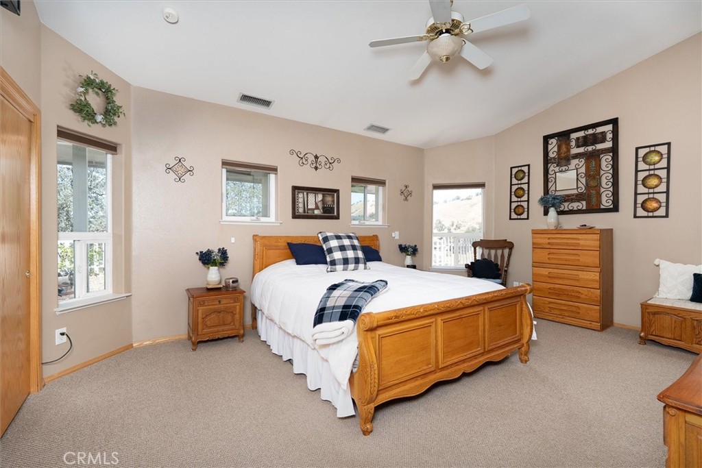 46455 Konklin Road Coarsegold, CA 93614 - Photo 26 of 46 a bed room with bed and a window