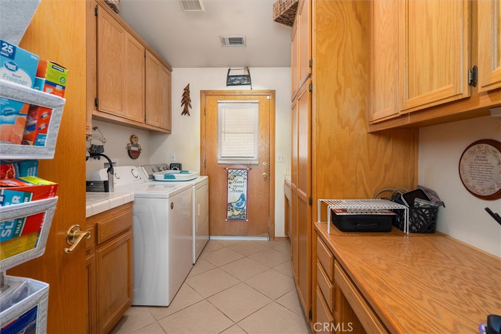 46455 Konklin Road Coarsegold, CA 93614 - Photo 30 of 46 a room with storage and utility